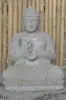  Product image 2 of the product “Seated Buddha with floral carving, Dharmacakra position. 67 cm height. Natural stone (river stone), stonemasonry. There is a stone eye in the chest. ”